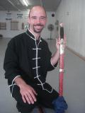 August 13, 2011: Laoshi Joel Valerio after his ascension ceremony with one of the gifts he received, a practice Chinese straight sword. 