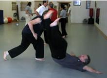In the Kwoon, ABC T'ai Chi with Spencer Gee (February 2005): Paul DeStefano from Integrated Martial Arts Institute throws McElroy Laoshi during a T'ai Chi Applications seminar.