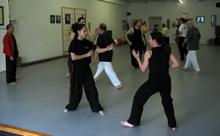 In the Kwoon, ABC T'ai Chi with Spencer Gee (May 2005): Players from various arts - T'ai Chi, Aikido, Choy Lei Fut, and Jun Ji Do - return for Mr. Gee's third T'ai Chi Applications seminar at the studio.
