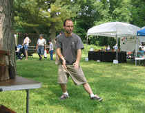 Sweetbriar Nature Center Wildlife and Craft Fair (June 11, 2005): Student Joel Valerio playing Rollback Walking beside the Water Tiger School booth at the fair.