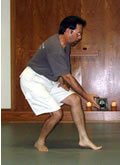 In the Kwoon, Paul Adago, Jr.'s Public Class Certification Ceremony (September 15, 2005): Si-Suk Paul Adago, Jr., in the posture Needle at Sea Bottom from Water Tiger School's 24-Posture Form.