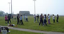 Tai Chi in the Park (May 27, 2006): The group enjoys playing Mirror Push Hands on a beautiful Saturday morning.