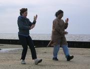 Tai Chi in the Park (May 20, 2006): Si-Ji Francesca DeStefano (L) and Uma Murthy in Playing the Pi Pa from the WTS 24-Posture Form.