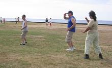 T'ai Chi in the Park (August 19, 2006): As is the trend, the morning's break allows for little pockets of T'ai Chi and conversation to unfold across the event's little patch of Shorefront Park.