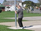 Tai Chi in the Park (September 16, 2006): ... Laoshi Laurince McElroy uses a post from the nearby basketball court to demonstrate proper position for the Bear Fighting from the Five Animal Frolics ...