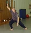 In the Kwoon, Introduction to Tai Chi Broadsword (October 2008): At the beginning of the afternoons seminar, Laoshi Laurince McElroy is in Dance of the Praying Mantis as he demonstrates Water Tiger Schools Yang-Influenced 24-Posture Tai Chi Broadsword (Dao) Form.