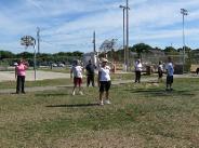 Tai Chi in the Park (August 14, 2010): A small group of participants at Shorefront Park come to understand the love / hate relationship folks have with Water Tiger Schools Chin Na Hand Exercises.
