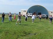 Tai Chi in the Park (June 18, 2011): Doing the best they can without their leader (someone has to take the picture), the mornings players float like clouds across the soggy grass of Patchogue's Shorefront Park.