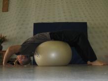 In the Kwoon (November 11, 2012): Laoshi Laurince McElroy in one of his favorite pre-class stretches  a supported backbend on a stability ball.