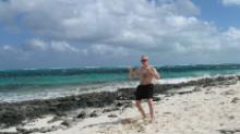 Smith's Reef on Providenciales, Turks & Caicos (March 5, 2017): Nothing like a little Tai Chi in Paradise.  McElroy Laoshi  doesnt miss an opportunity to play Water Tiger's Medium-Frame Yang-Style 24-Posture Form on the white coral sand at the water's edge  even though hes on holiday.