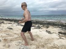 Smith's Reef on Providenciales, Turks & Caicos (March 9, 2018): Playing around exposed coral on the beach, McElroy Laoshi keeps to his habit of playing a little Tai Chi in Paradise.  Here he is in Repulse the Monkey from Water Tiger's Medium-Frame Yang-Style 24-Posture Form.