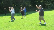 Tai Chi in the Park (June 9, 2018): This Kodiak moment shows the grizzly bunch of players who joined us for the day's T'ai Chi in the Park in the Town of Brookhaven's Peppermint Park (Medford, NY USA). They, reportedly had a beary good time. Yep, we did a cutting from the Bear Frolics from our lineage's version of The Five Animal Frolics (Wu Qin Xi). Pictured is the group playing Bear Fighting.
