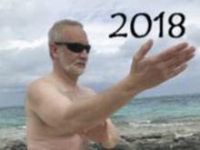 Smith's Reef on Providenciales, Turks & Caicos (March 9, 2018): In Ward-Off with the northern Caribbean beside him, McElroy Laoshi plays Water Tiger's Medium-Frame Yang-Style 24-Posture Form while vacationing in Paradise.