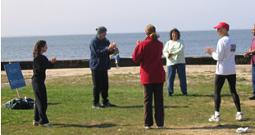 World Tai Chi & Qigong Day; Shorefront Park, Patchogue NY (April 24, 2004): Dr. Ron Rebhuhn (in center with cap), from Westbury, leading the Primary Fragrance Qigong (or Xiang Gong) set.