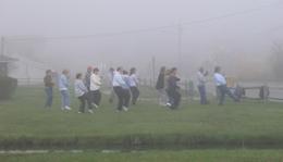 World Tai Chi & Qigong Day; Shorefront Park, Patchogue NY (April 28, 2007): Playing through the fog of the early morning, Bill Donnelly, Green Cloud Kung Fu (3rd from Right in Blue), leads participants in a Tai Chi Walking Exercise.