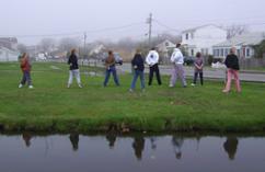World Tai Chi & Qigong Day; Shorefront Park, Patchogue NY (April 28, 2007): By the end of the morning the fog was rising and people were playing the Golden Elixirs with Sifu Michael Evans (3rd from R), Shaolin Kung Fu Studios.