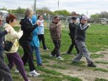 World Tai Chi & Qigong Day; Shorefront Park, Patchogue NY (April 30, 2011): From Holbrooks Green Cloud Kung Fu, Bill Donnelly (R) leads his group through various exercise to help with solo development.