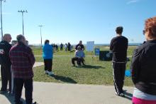 World Tai Chi & Qigong Day; Shorefront Park, Patchogue NY (April 27, 2013): Taiji & Qigong for Spinal Health and Pain Relief brings a hands-on experience to our event from Chris Jurak (C - behind), One-to-One Care Physical Therapy of Bay Shore.