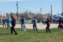 World Tai Chi & Qigong Day; Shorefront Park, Patchogue NY (April 27, 2013): Detailing the posture of Press (Ji), its a version of Everything You Want to Know About Grasp Sparrows Tail with Elan Abneri (L - in black vest), Zhang Style Tai Chi of Centereach.
