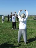 World Tai Chi & Qigong Day; Shorefront Park, Patchogue NY (May 3, 2014):  The first person fully certified in the Water Tiger lineage, Laoshi Joel Valerio (L) of Ozone Park, guides people through his workshop titled Weaving through The Standing Eight Pieces of Brocade one stitch at a time.
