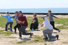 World Tai Chi & Qigong Day; Shorefront Park, Patchogue NY (May 3, 2014): Bill Donnelly (C - back), Green Cloud Kung Fu in Patchogue, brought some Taoist Yoga moves to this years event. Photo by Joe Cavaliere, taichi-daily.com.