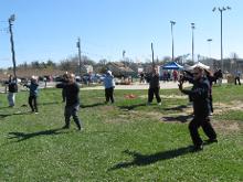 World Tai Chi & Qigong Day  Patchogue (April 25, 2015): Chris Jurak (C - front), Mountain Stream Tai Chi and Qigong in Brightwaters, introduces participants to the Tai Chi Ten Directions Form, a series of basic Tai Chi movements that is the first sequence taught in his schools curriculum.