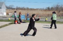 World Tai Chi & Qigong Day  Patchogue (April 25, 2015): Even with five different people taking photographs as the morning unfolded, we did not get a single photo of Joseph Panico, West Babylon, leading his late-morning workshop introducing people to his lineage's 24-Posture Form, but we did get this shot of him playing the form earlier in the morning.