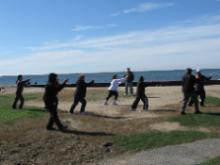 World Tai Chi & Qigong Day  Patchogue (April 25, 2015): Teresa White (C - in white), Long Island Tai Chi in Babylon, puts people through their paces in her workshop Characteristics of Classical Northern Wu Style Tai Ji Quan - The Fighting Art of the Manchurian Palace Guard.