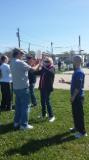 World Tai Chi & Qigong; Shorefront Park, Patchogue NY (April 30, 2016): People being coached on the finer aspects of Mirror Push Hands by Laoshi Joel Valerio (R) of Ozone Park, during his workshop, "Introduction to Push Hands".