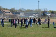 World Tai Chi & Qigong; Shorefront Park, Patchogue NY (April 30, 2016): The group follows the lead of Bill Donnelly (R), Green Cloud Kung Fu, during his workshop this year focusing on the Yin and Yang aspects of Tai Chi and Qigong.