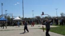 World Tai Chi & Qigong; Shorefront Park, Patchogue NY (April 30, 2016): Spread across both the parks basketball courts, the Facilitators Demonstration proves again that many paths lead to the same destination.  (L to R) Spencer Gee (Spencer Gee Wellness Corporation), Chris Jurak (Mountain Stream Tai Chi and Qigong), Bill Donnelly (Green Cloud Kung Fu), Jean Klein (Long Island School of T'ai-Chi-Chuan), Teresa White (Long Island Tai Chi), Bob Klein (Long Island School of T'ai-Chi-Chuan), Joel Valerio (Ozone Park), Joseph Panico (West Babylon), and Laurince McElroy (Water Tiger School of Tai Chi Chuan). Not pictured are Judith Budd-Walsh (Harmonious Movement) and Alan Sims (New York City).