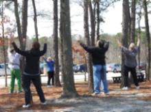 World Tai Chi & Qigong Day; Diamond in the Pines, Coram NY (April 28, 2018): Laurince McElroy (R), Water Tiger School of Tai Chi Chuan in Medford, leading participants in Opening the Sky, the last piece of his workshop, Branching Out Your Energy Work: An Introduction to Arbor Qigong.