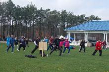 World Tai Chi & Qigong Day; Diamond in the Pines, Coram NY (April 28, 2018): Joseph Panico (R in red), West Babylon, leading participants in the details of his lineages 24-Posture Form.