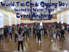 Tile image hyperlink to Water Tiger's World T'ai Chi & Qigong Day Event Archive - a photo of various people in a gymnasium playing various forms and sets of T'ai Chi Ch'uan and Qigong.