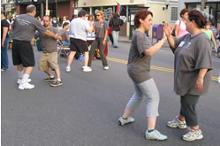 Village of Patchogue, St. Jude Children's Research Hospital Fundraiser (August 19, 2005): Students (L to R) Ed O'Connell, Joel Valerio, Gail Harfe, Patricia Hsieh, Francesca DeStefano, and April Alexander Pushing Hands for a Cause.