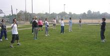Tai Chi in the Park (May 27, 2006): Si-Ji Francesca DeStefano (R) guides the mornings participants through Water Tiger Schools signature Shaolin Chin Na Hand Exercises.
