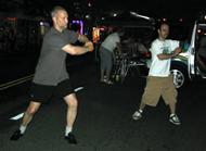 Village of Patchogue, Alive After Five (July 21, 2006): Laoshi Laurince McElroy leading Joel Valerio in Dragon Strikes to the Four Diagonals. This was Joels first time through the complete form and the first time such a Water Tiger School event unfolded during a public presentation!