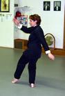 In the Kwoon, Francesca DeStefanos Public Class Certification Ceremony (January 27, 2007): Si-Goo Mui Francesca DeStefano in the posture White Crane Spreads Her Wings from Water Tiger Schools 24-Posture Form.