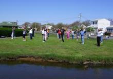 Tai Chi in the Park (May 5, 2007): The first morning in the park draws to a close with Laoshi Laurince McElroy leading the group in the posture of White Crane Spreads Her Wings from Water Tigers Tai Chi Qigong Breathing Set. 