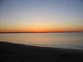 Blue Point, Long Island (June 21, 2007): On a beach overlooking Patchogue Bay, a few hearty members of Water Tiger School met to greet the sunrise of Summer Solstice at 5:21 AM with a little Tai Chi play.