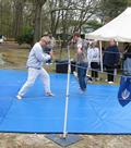 Camp Edey (Bayport), Girl Scouts of Suffolk County's GirlFest `08 (May 3, 2008): Playing the posture Brush Knee Step and Strike, Laoshi Laurince McElroy sends Si-Hing Joel Valerio flying backwards during a martial applications demonstration at the Martial Arts for Every Girl tent at the day-long event.