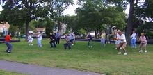 Tai Chi in the Park (August 23, 2008): With Shorefront Park taken over by The Battle for the Bay, Father Tortora Park in Patchogue sets the stage for Si-Suk Paul Adago, Jr. (L), to lead the mornings participants in Polishing the Mirror from The Temple Set.