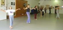 In the Kwoon, Grace of the Crane (September 2008): Laoshi Laurince McElroy (R) helps the group connect with a sense of grace and elegance while remaining light and peaceful with the Crane Flying, one of the five walks of the Crane from Wu Qin Xi (the Five Animal Frolics).