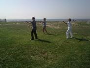 Tai Chi in the Park (August 15, 2009): A trio of Water Tiger students play during the mornings break. They are (L to R) Kathy Schwager, Si-Je Patricia Hsieh, and Rita Valentin.