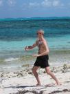 Turtle Cove, Providenciales; Turks & Caicos (February 2011): Laoshi Laurince McElroy in Parting the Wild Horses Mane from Water Tigers 24-Posture Form as he starts this and every morning on his annual escape to Provo with a little Tai Chi in the sand.