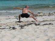 Turtle Cove, Providenciales; Turks & Caicos (February 2011): The sand is soft, the sun is warm, the water is as blue as the sky, and Laoshi Laurince McElroy is creeping down like a snake.