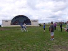 Tai Chi in the Park (August 23, 2014): McElroy Laoshi (in grey tank center) demonstrating aspects of the 13 Root Energies of T'ai Chi by playing a Basic Martial Application with a willing and able event participant.