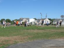 Tai Chi in the Park (August 8, 2015): Prayer Wheel from The Nine Temple Exercises is an event warm-up favorite. The turning of the wheel is being led this morning by Laoshi Laurince McElroy (L).