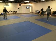 In the Studio (January 27, 2019): Some variety on the mat during our Sunday evening Advanced Class in the studio. (L to R) Mark Williams with our Yang-Influenced Simplified 32-Posture Tai Chi Jian, Laoshi Joel Valerio with our Traditional Yang-Style 48-Posture Tai Chi Gan, and James Brennan with our Medium-Frame, Yang-Style, 24-Posture Tai Chi Short Form.