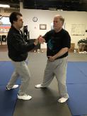 In the Studio (February 24, 2019): The last calendar week of every month is our Festival of Push Hands in the studio. Here Mark Williams (R) is helping Nick Sucarato (L) understand the intricacies of Water Tigers Symbiotic Push Hands partnership.